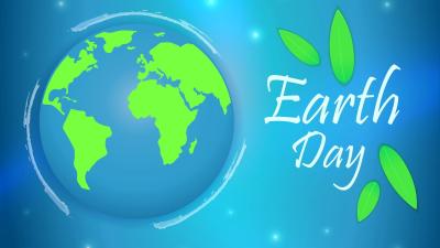 Picture of earth with green leaves around the words "Earth Day"