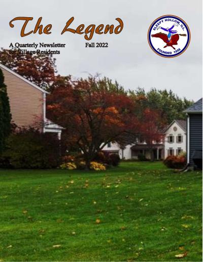 Fall 2022 cover of The Legend depicting a green field before a white house in the background and tree with reddish brown leaves.