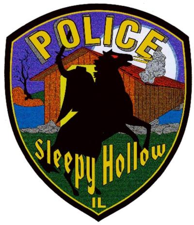The SHPD arm patch that depicts a headless horseman riding a rearing horse in front of a covered bridge